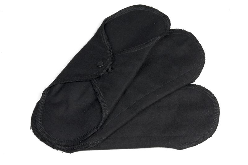 Imsevimse black washable night pad for women, 3-pack, reusable menstrual pad for overnight comfort, made of soft, absorbent material.