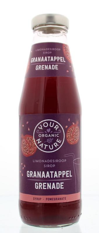 Bottle of Your Organic Nature organic pomegranate syrup for drinks, 500ml, with a label showing fresh pomegranate imagery.
