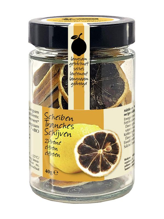 Amanprana Zwarte Citroen schijfjes, organic black lemon slices in a 40g package, used for flavoring or garnish.