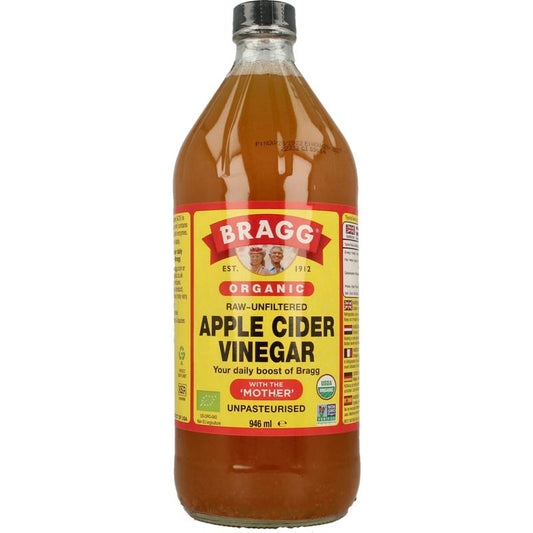 Bragg organic apple cider vinegar in a 946ml bottle, showcasing the label and clear liquid inside.