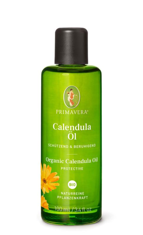 Primavera Calendula Bio Essential Oil in 100ml bottle, showcasing vibrant orange flower petals and amber-colored oil.