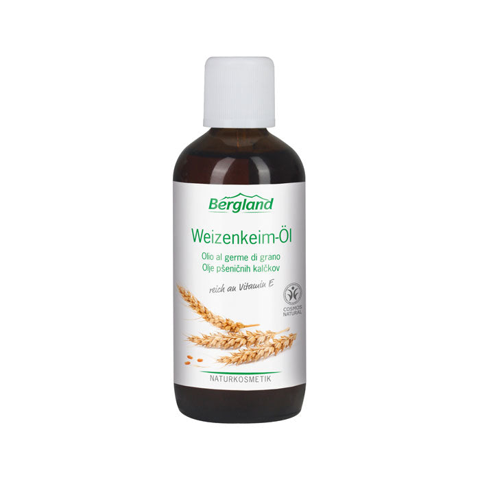 Bergland Tarwekiemolie 100ml bottle for body care, with golden oil visible in a clear container, on a white background.