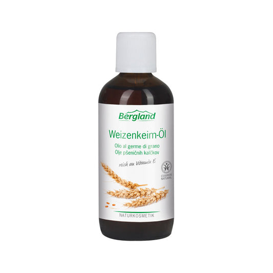 Bergland Tarwekiemolie 100ml bottle for body care, with golden oil visible in a clear container, on a white background.
