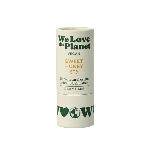 We Love Lipbalm Sweet Honey vegan lip balm in a 7-gram container, designed for nourishing and moisturizing lips naturally.